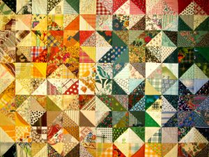 Textielkunst: patchwork kunstwerken en gequilte telefoonhoesjes